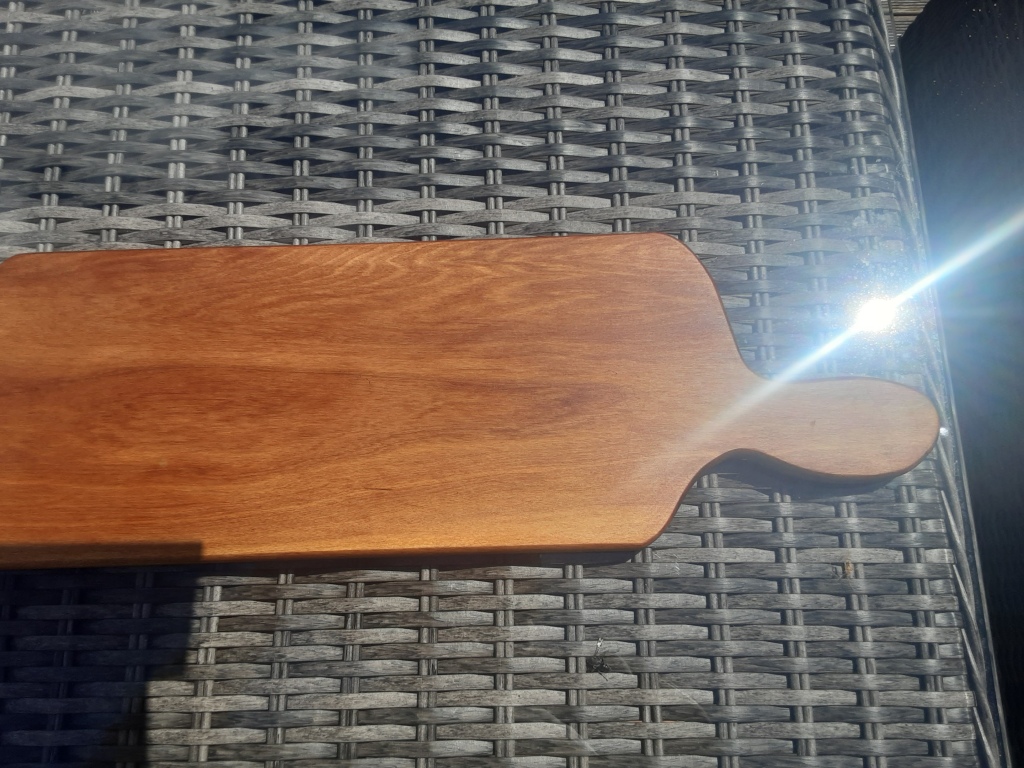 Leaf-shaped charcuterie board in recycled rimu finished with Grumpy Bob board wax.